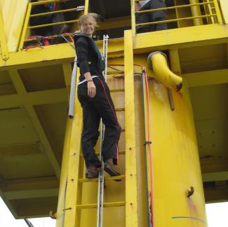 meg climbing ladder at icbm station