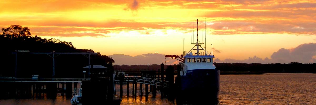 The RV Savannah at dock during sunset